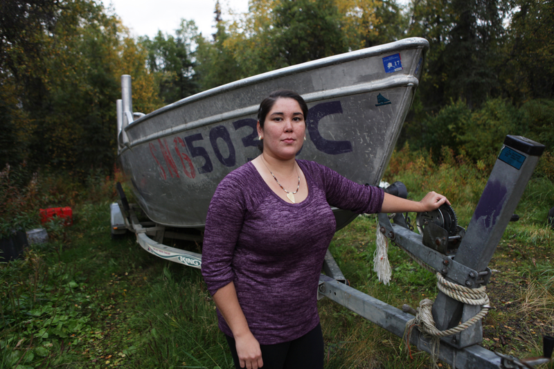 Alannah Hurley standing next to her set-net skiff in Dillingham, Alaska; she’s been fishing in Bristol Bay for her entire life. Photo credit: Duncan Sullivan